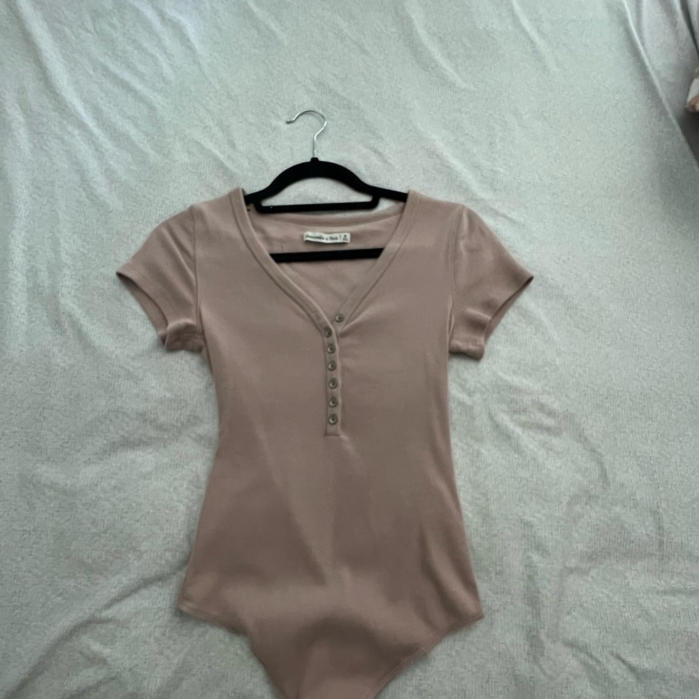Blush colored bodysuit